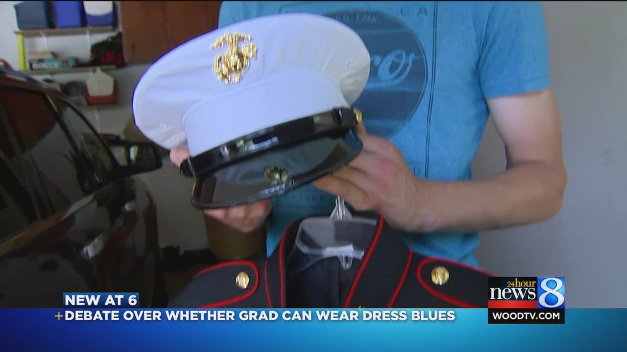 Marine: High school said to change out of uniform before ceremony