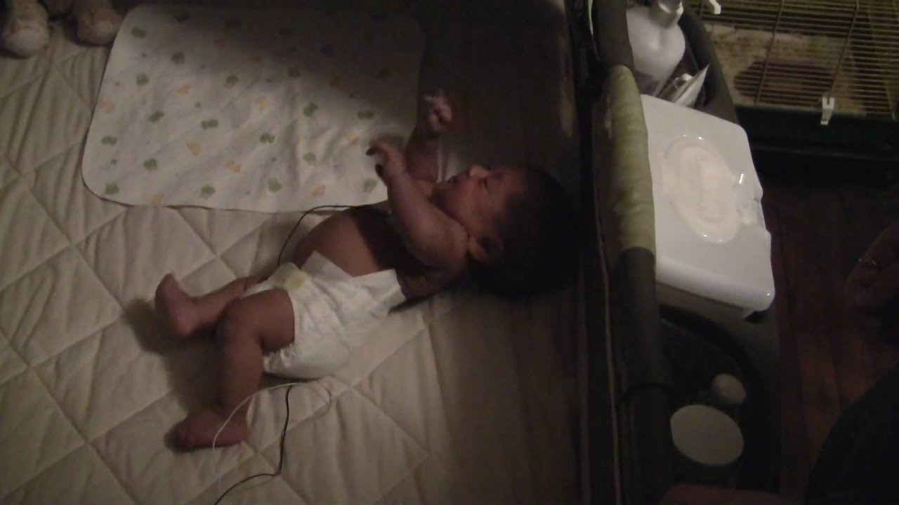 Baby rolling over at 1 day old. (age corrected)