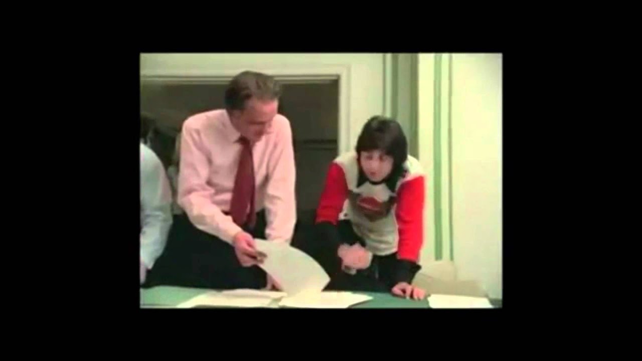 The Beatles signing breakup papers