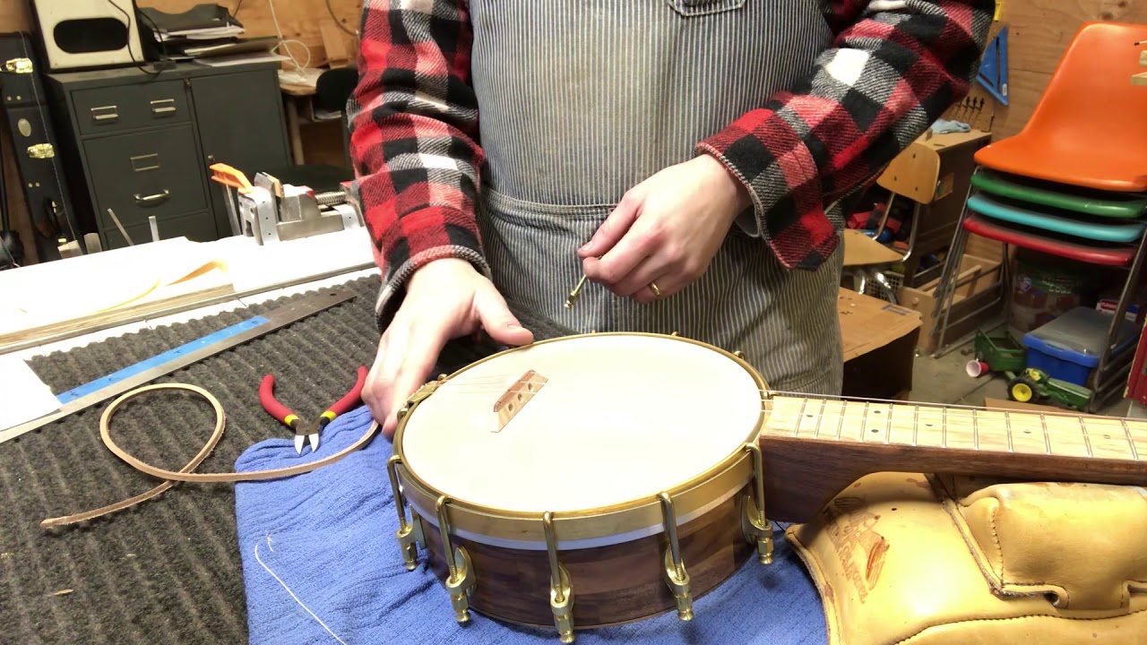Tying a banjo uke string on a no-knot tailpiece!