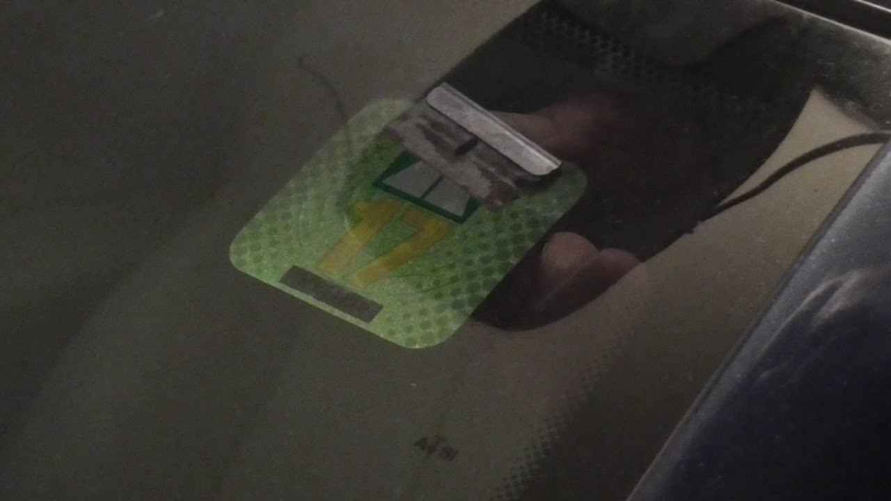 Swiss motorway vignette removal and transfer to other car