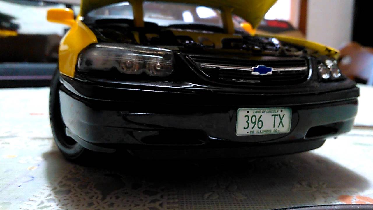 Umboxing Chevrolet Impala Taxi Maisto 1/18