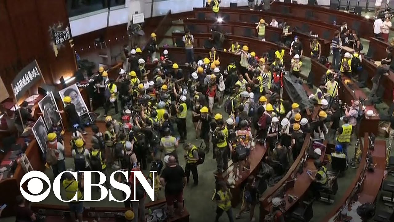 Hong Kong police threaten protesters with 