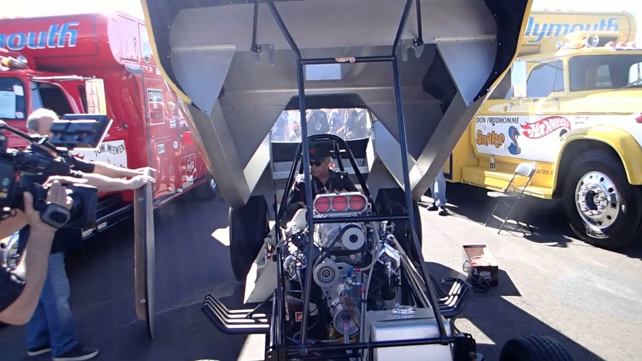 The Snake starting his car at Barrett-Jackson 1-18-14