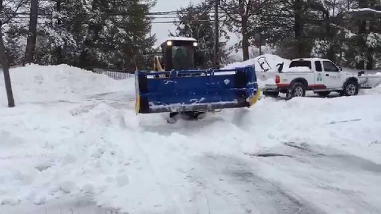 2015 Condo Snow Removal with Cat 272D and Kage Innovations plow