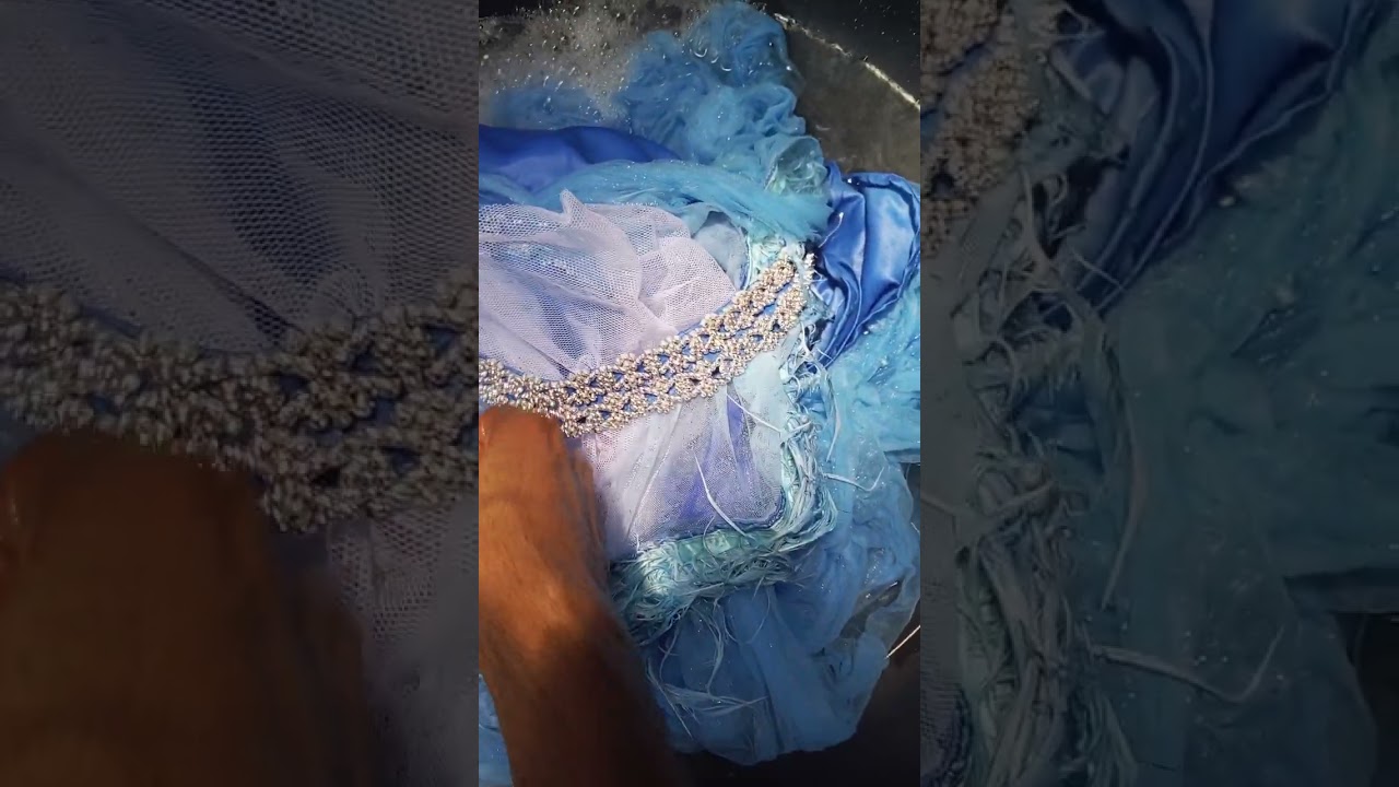 Making the blue gown clean and new again 