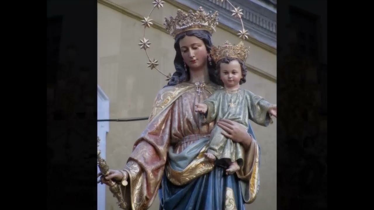 A MARIA AUXILIADORA.