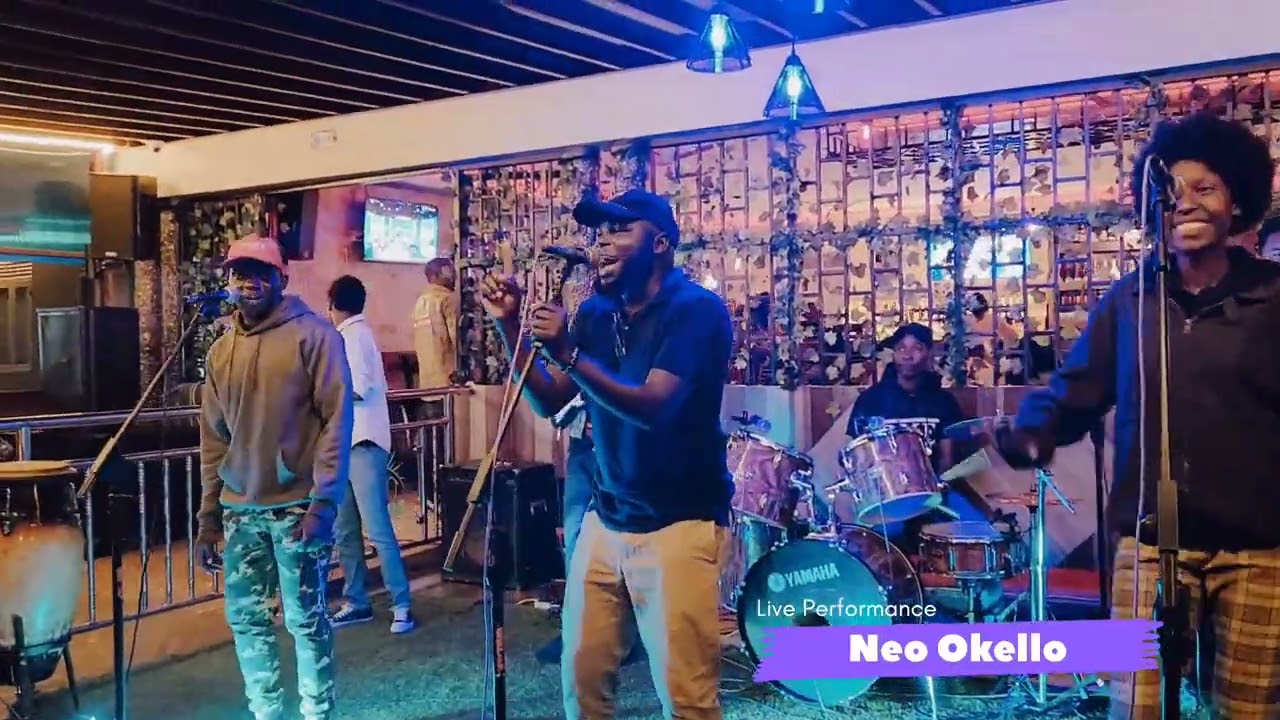 Neo Okello Performing In Aye Live at Kweyo Shoppers