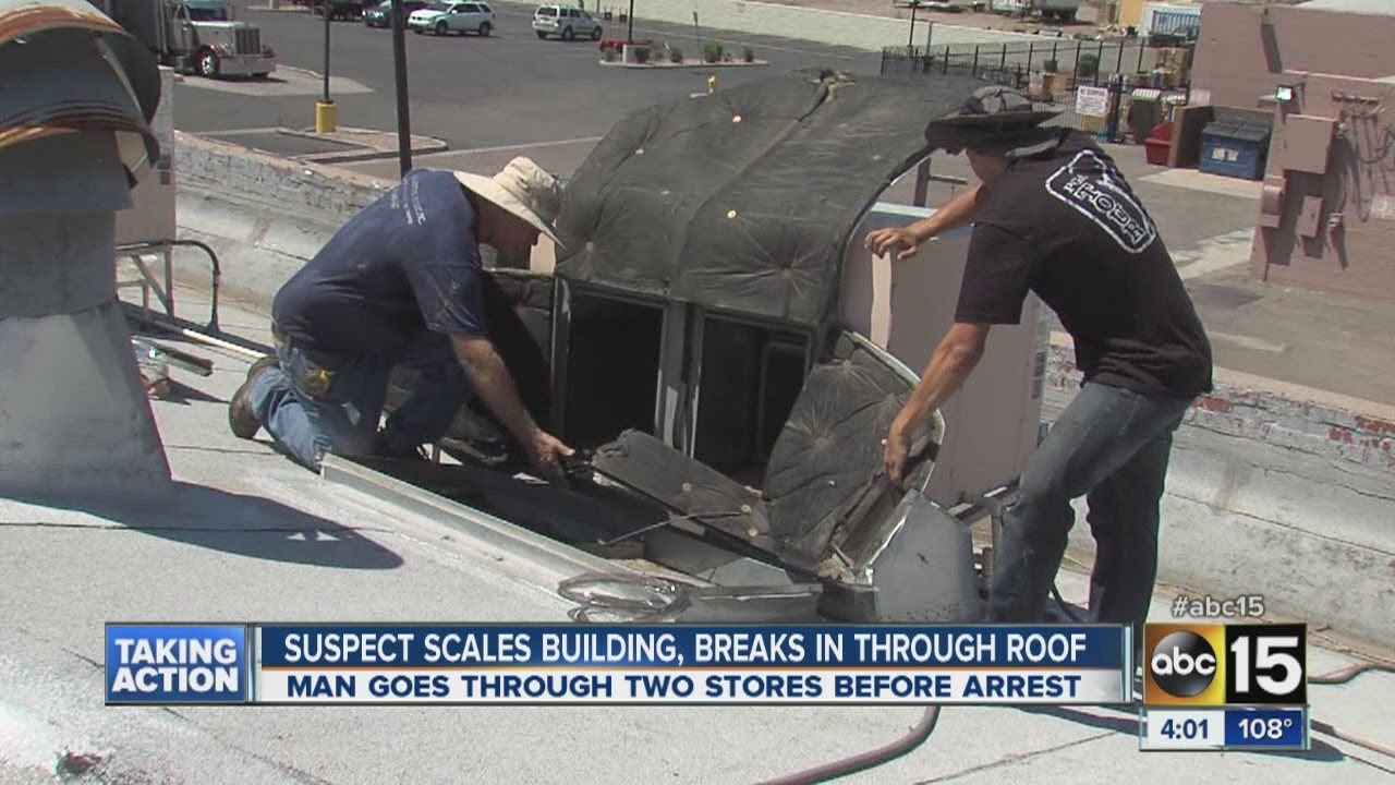 Suspect scales building, breaks into business through roof