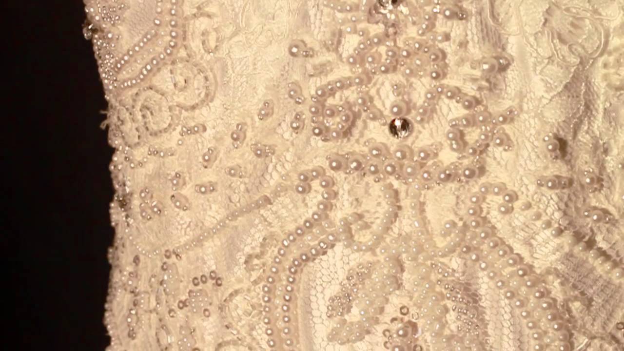 BEHIND THE SEAMS - Delicate beading on a French lace wedding dress