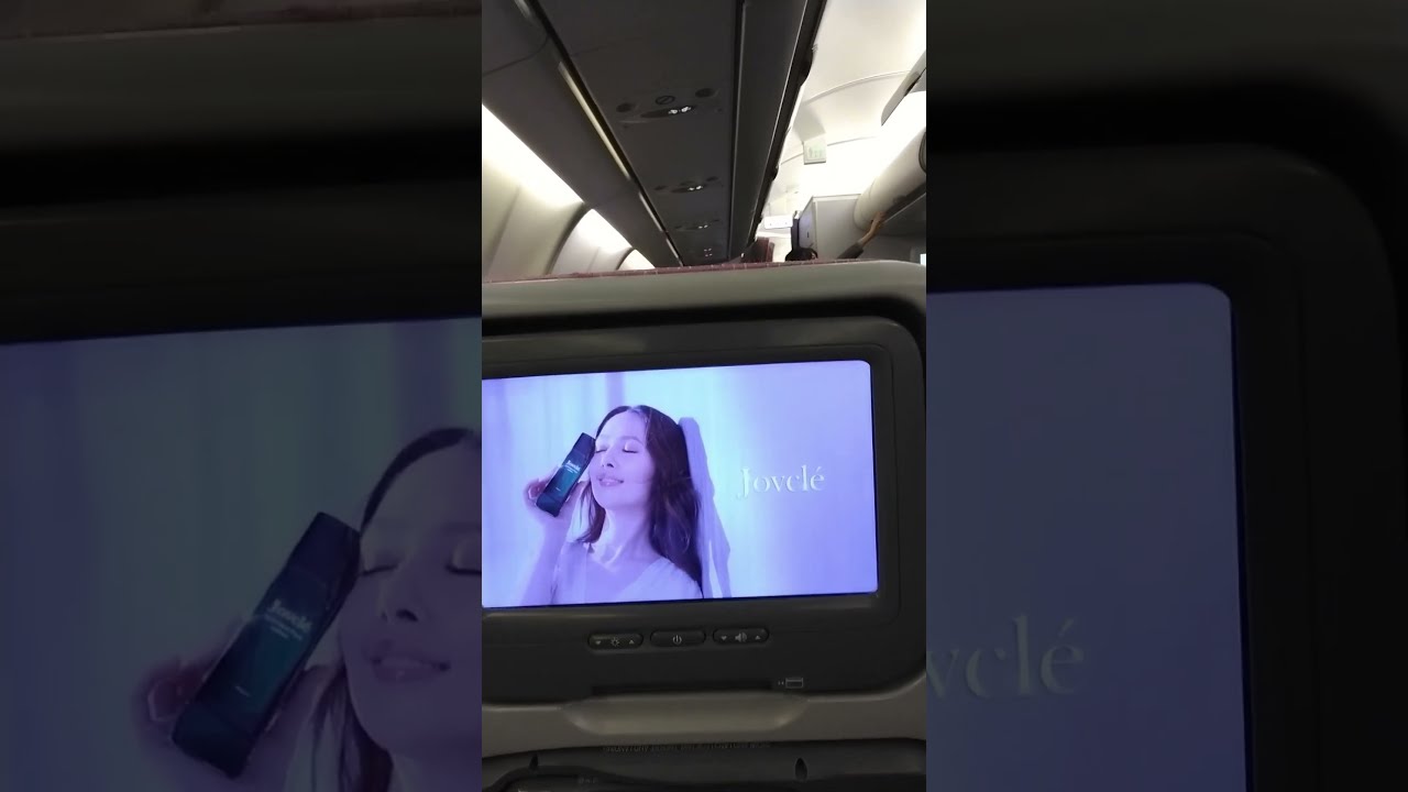 Settling-in for China Airlines flight in economy class