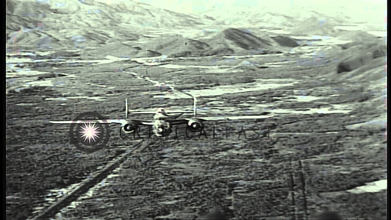 B-25 Mitchell aircraft fly in a formation over the Caroline Islands in the Pacifi...HD Stock Footage