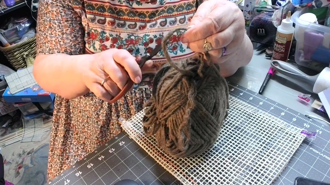 Getting ready to locker hook with yarn