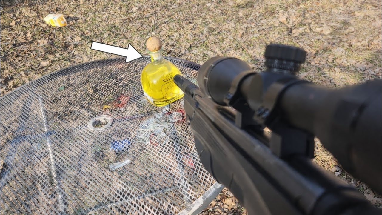 Suppressed Air Hunting Rifle VS Patron Tequila Bottle