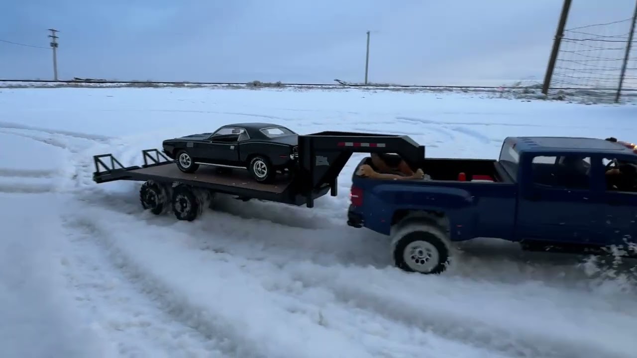 Chevy 3500 hauling awesome mopar in snow #rc #hpi #silverado #rccar #rctruck 