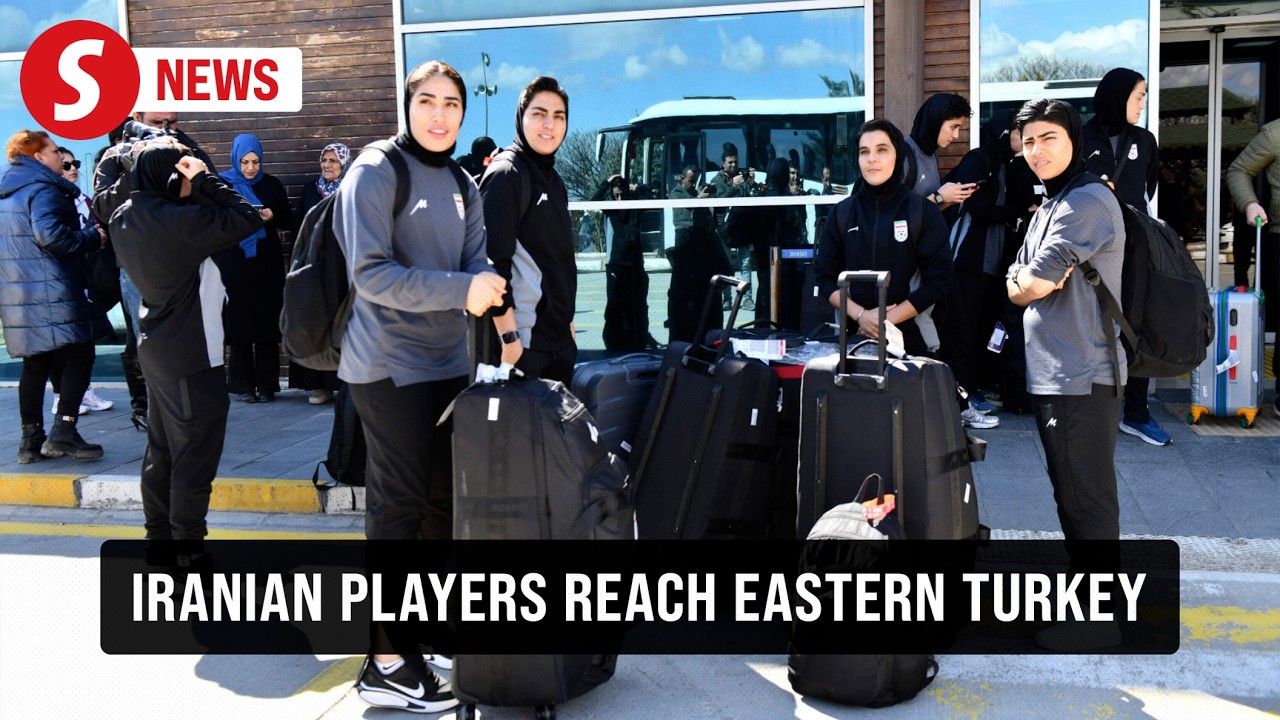 Iranian women's soccer team arrives at airport in eastern Turkey on journey home