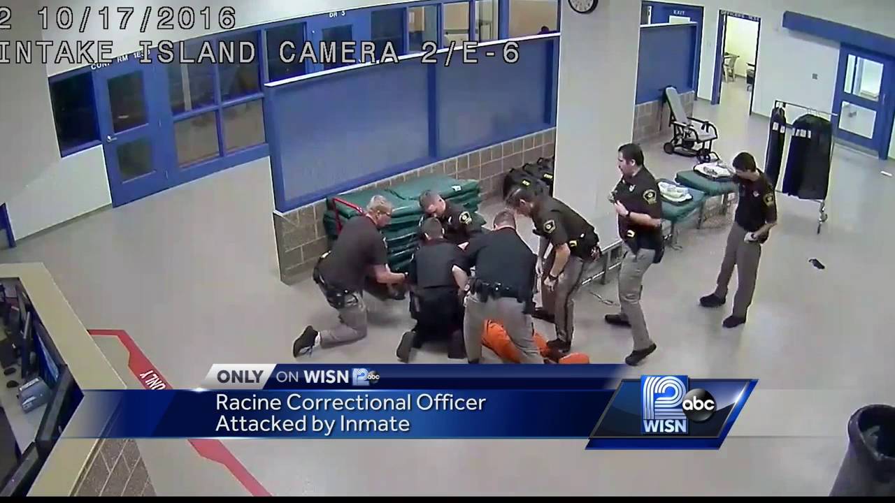 Surveillance video shows Racine County Corrections officer being attacked
