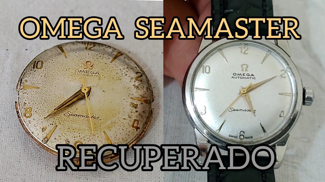 OUTRO MOSTRADOR RESTAURADO - OMEGA AUTOMÁTICO  - DESGASTE NA PONTE DO TAMBOR
