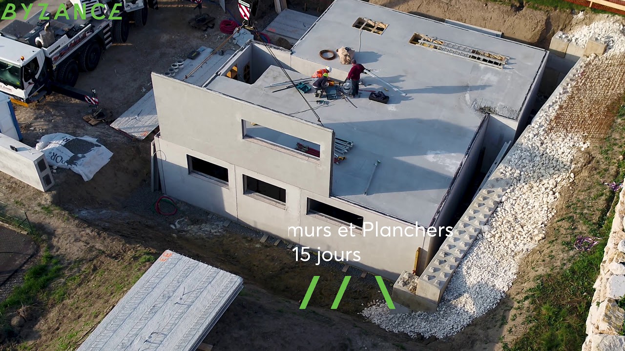 Conception et construction d'une villa en béton préfabriqué Magmur 30 à Challex par Byzance Design.
