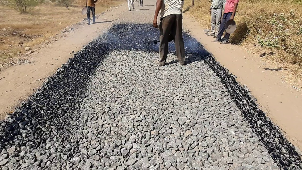 MPM Modified Penetration macadam by hand method on village Road