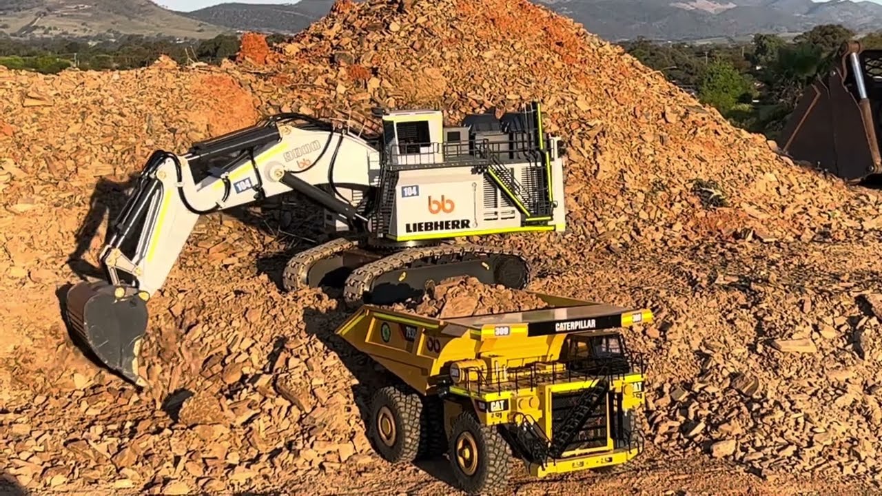 Liebherr RC 9800 excavator with Cat 793 Dump truck- First Dig Mining