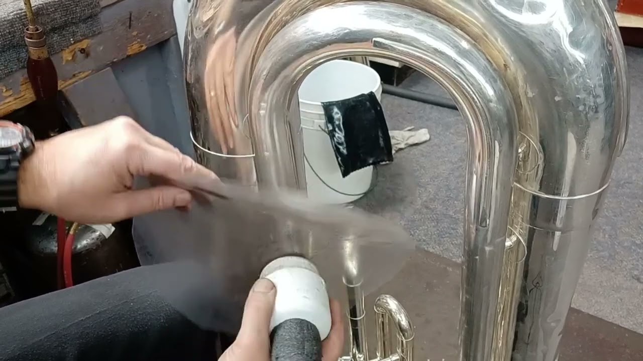 Large brass instrument dent work - jim huwe