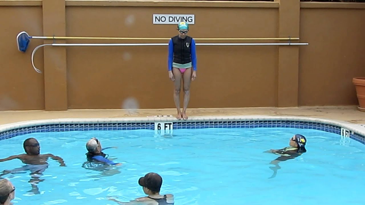 Renee's first jump into the deep. Learn to Swim with Miracle Swimming.