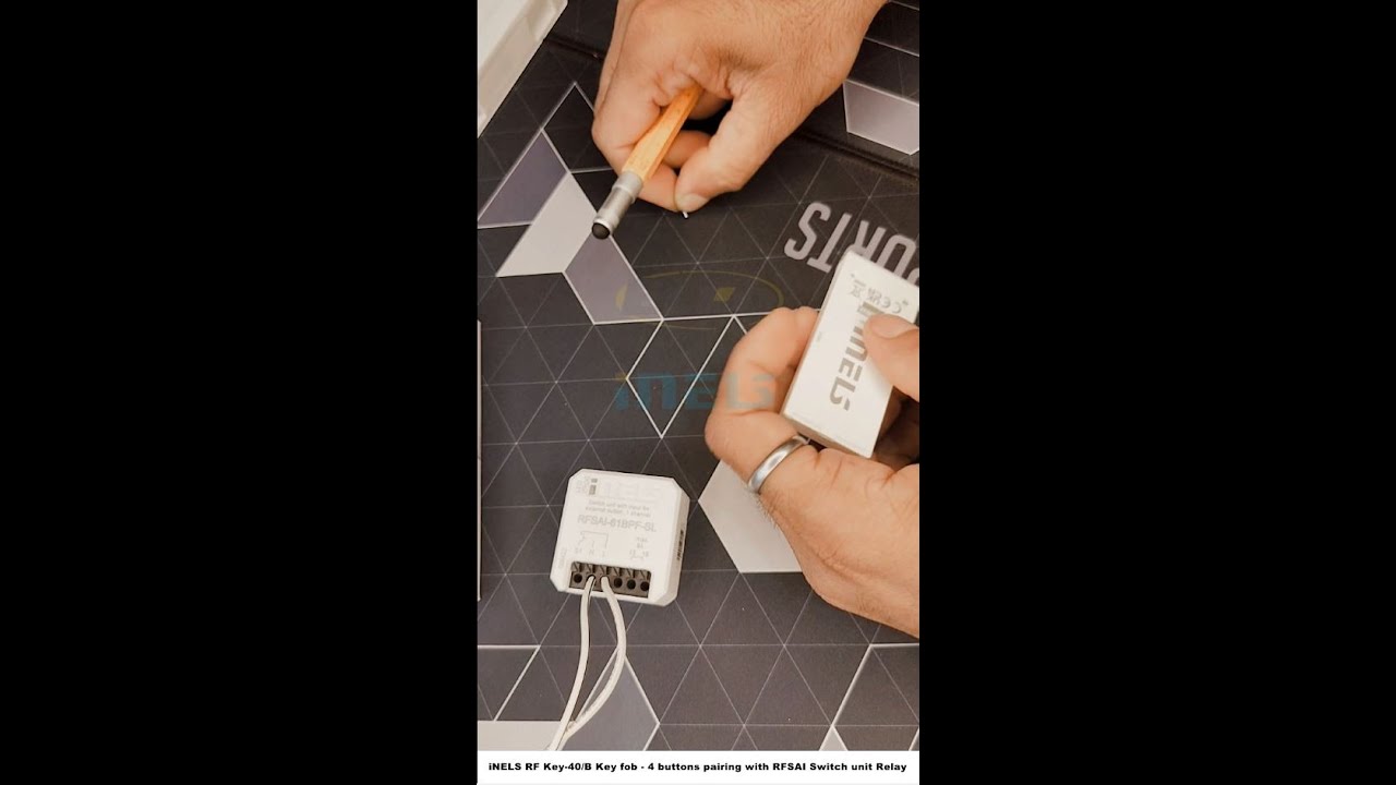 iNELS RF Key-40/B Key fob - 4 buttons pairing with RFSAI Switch unit Relay
