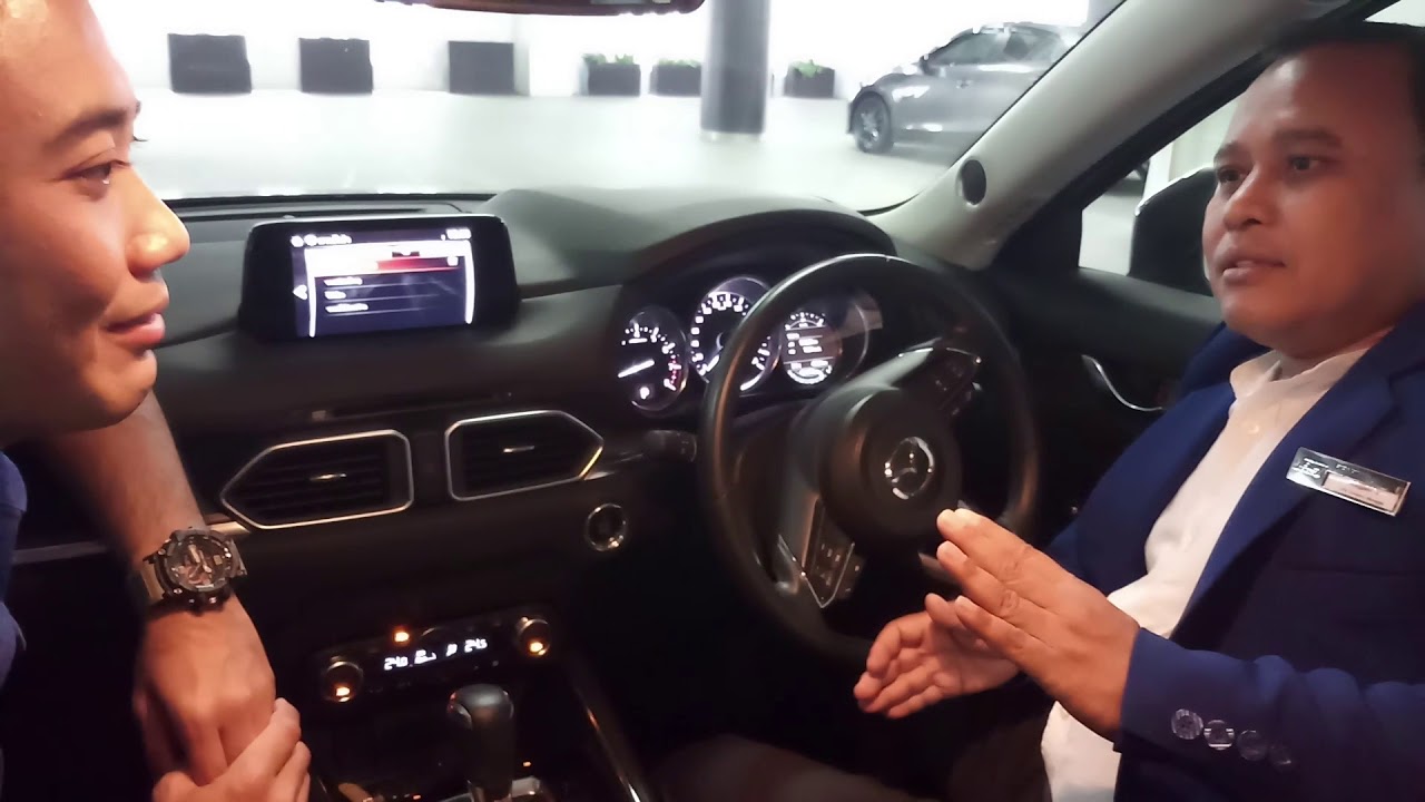 การใช้งานปัดน้ำฝนหน้า Auto ในรถยนต์ Mazda