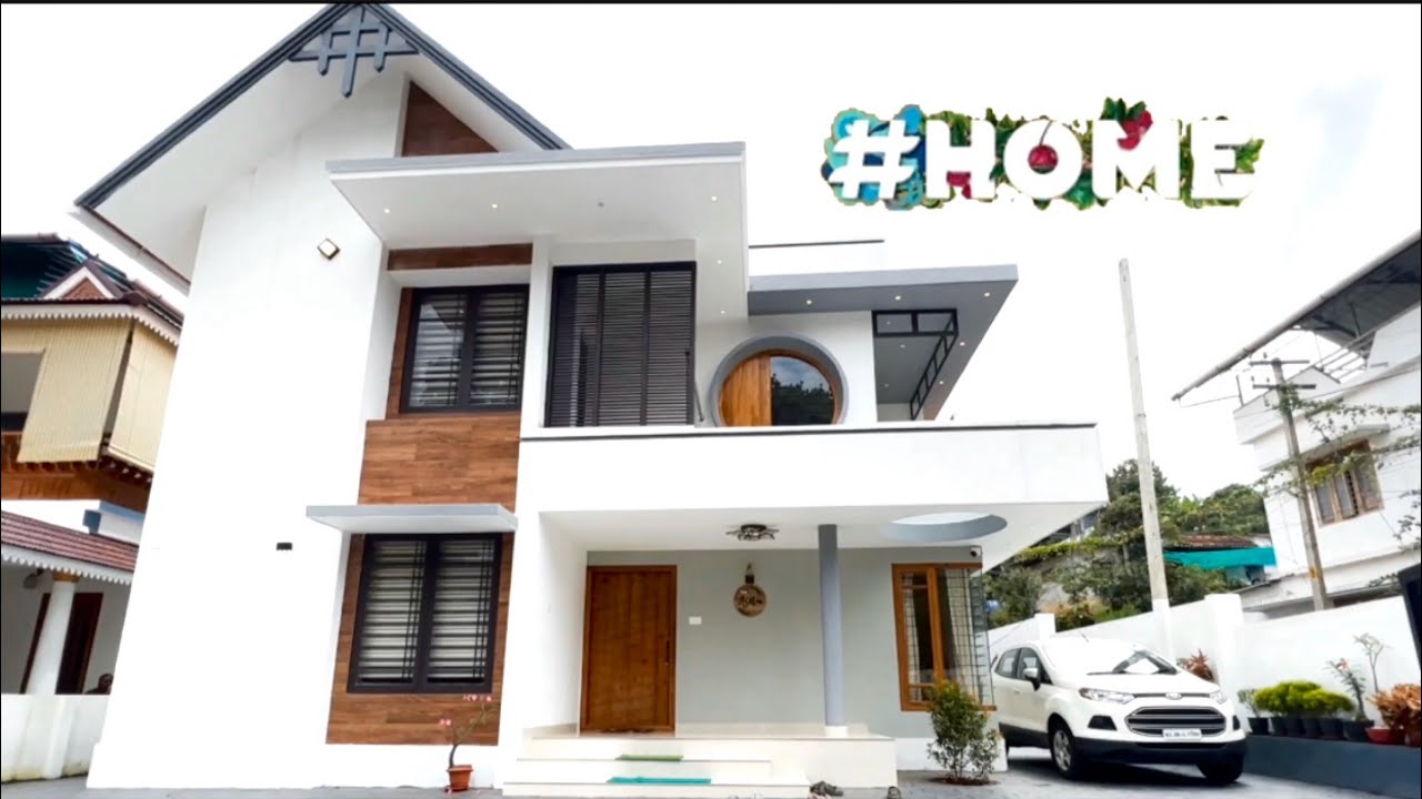 ARCHITECTURE ദമ്പതിമാർ  നിർമിച്ച  മനോഹരമായ  ഒരു  വീട്