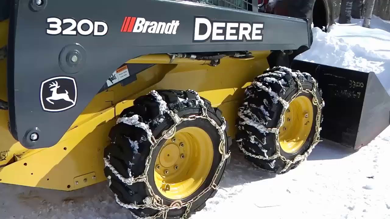 TIRE CHAINS ON  320D SKID STEER, WHAT WE THINK