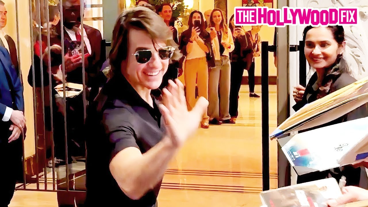 Tom Cruise Signs Autographs For A Mob Of Fans While Arriving At His Hotel In New York, NY