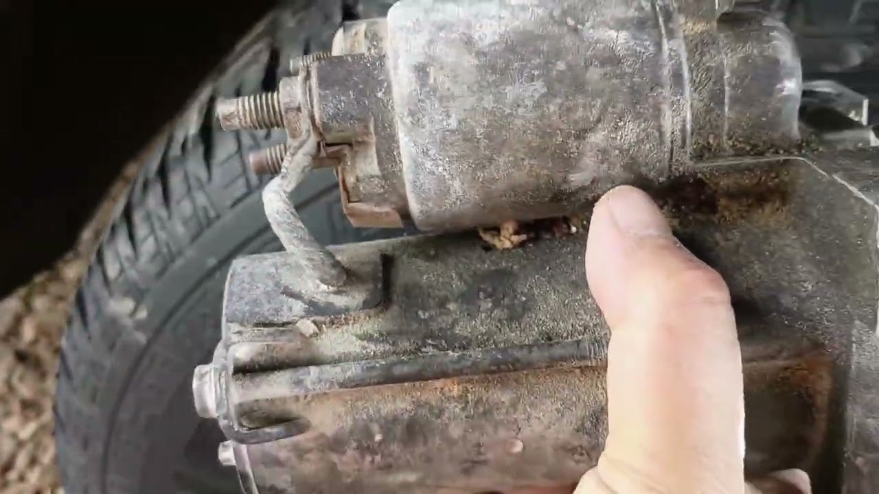 Como localizar la marcha  o starter de Chevy Suburban 2007 