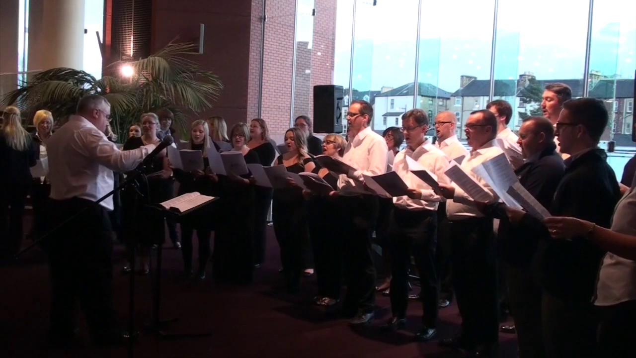 SATCOL singers perform 'Do you hear the people sing'