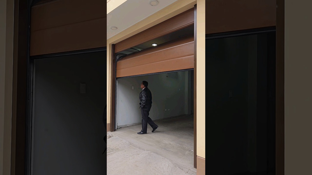 Puerta seccional automática fabricado con Panel importado 