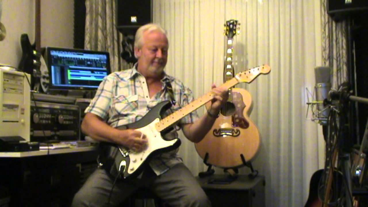 Two Piña Coladas - Garth Brooks (played on guitar by Eric)