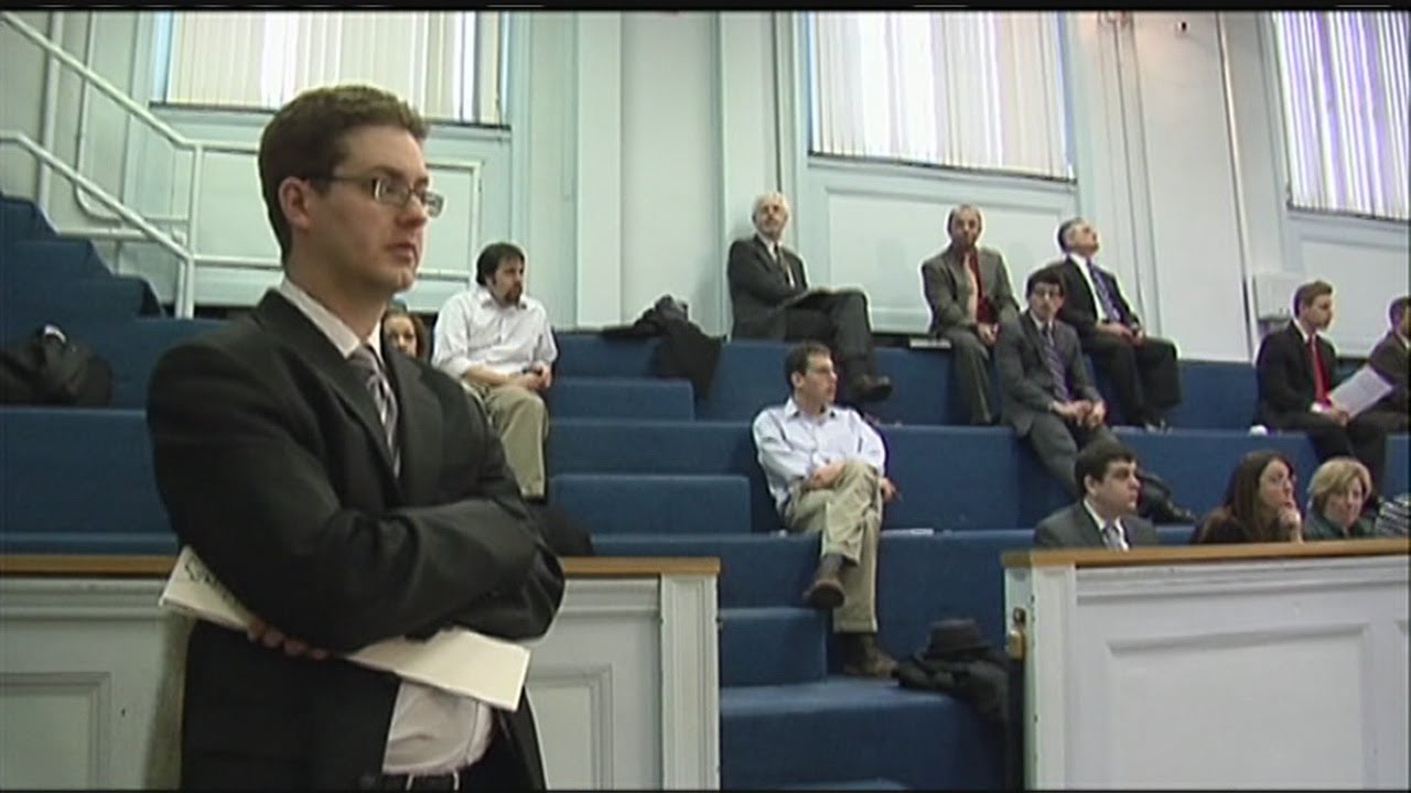 Gov's budget chief grilled on tax hikes
