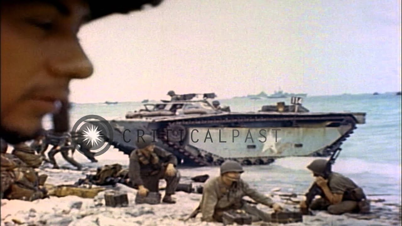 LVT and tank destroyer arrive on a beach Eniwetok Atoll, Marshall Islands during ...HD Stock Footage