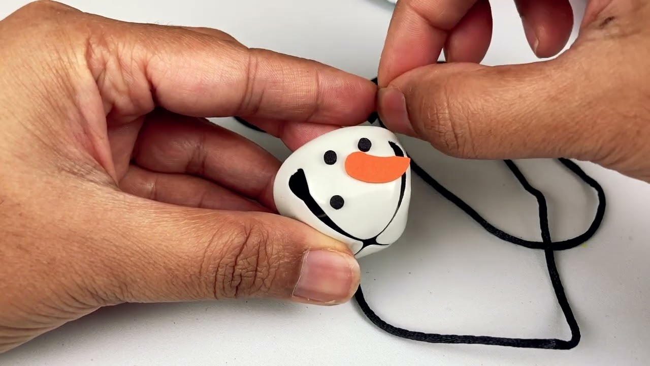 Christmas Holiday Fun and Surprise with Marshamallow: Day 11 Advent Calendar Making a bell necklace!