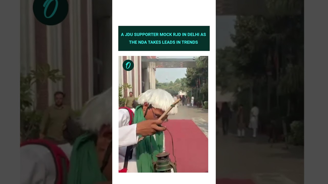 A JDU supporter mock RJD in Delhi as the NDA takes leads in trends.