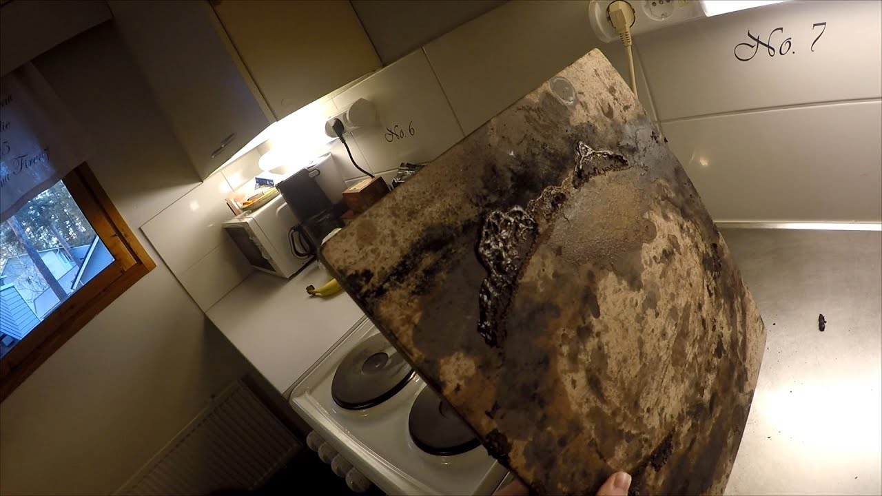 Pizzakiven puhdistaminen