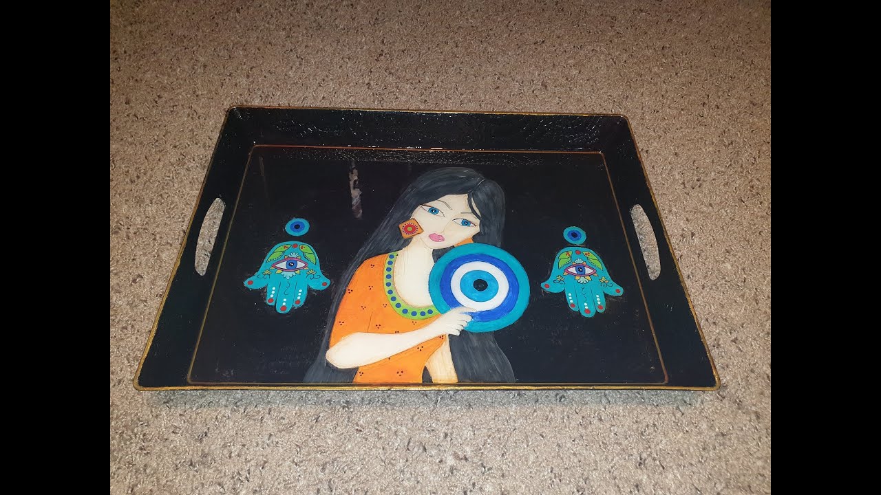 رسم البغداديات على صواني التقديم