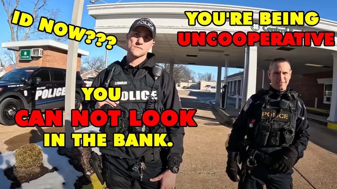 Stupid Cop Demands ID for No Reason &mdash; Threatens Citizen & Bans Him from Looking at the Bank!