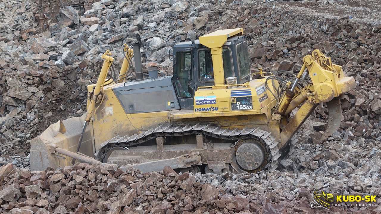 Komatsu D155AX - dozer pushing rock