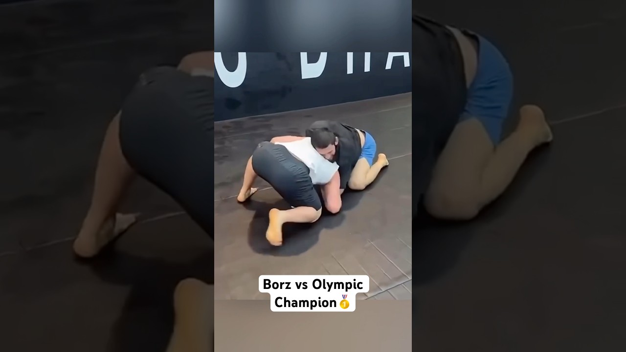 Khamzat Chimaev grapples with Razambek Zhamalov