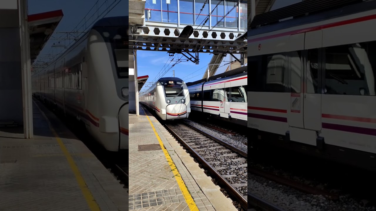 Renfe 449 entrando y saliendo de Villalba con pitada