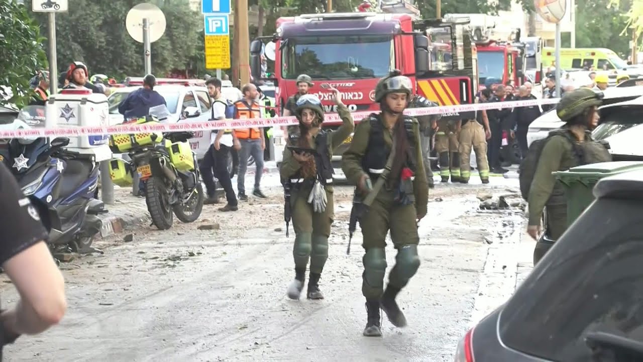 Emergency services at site of impact in Tel Aviv following Iranian missile attack | AFP