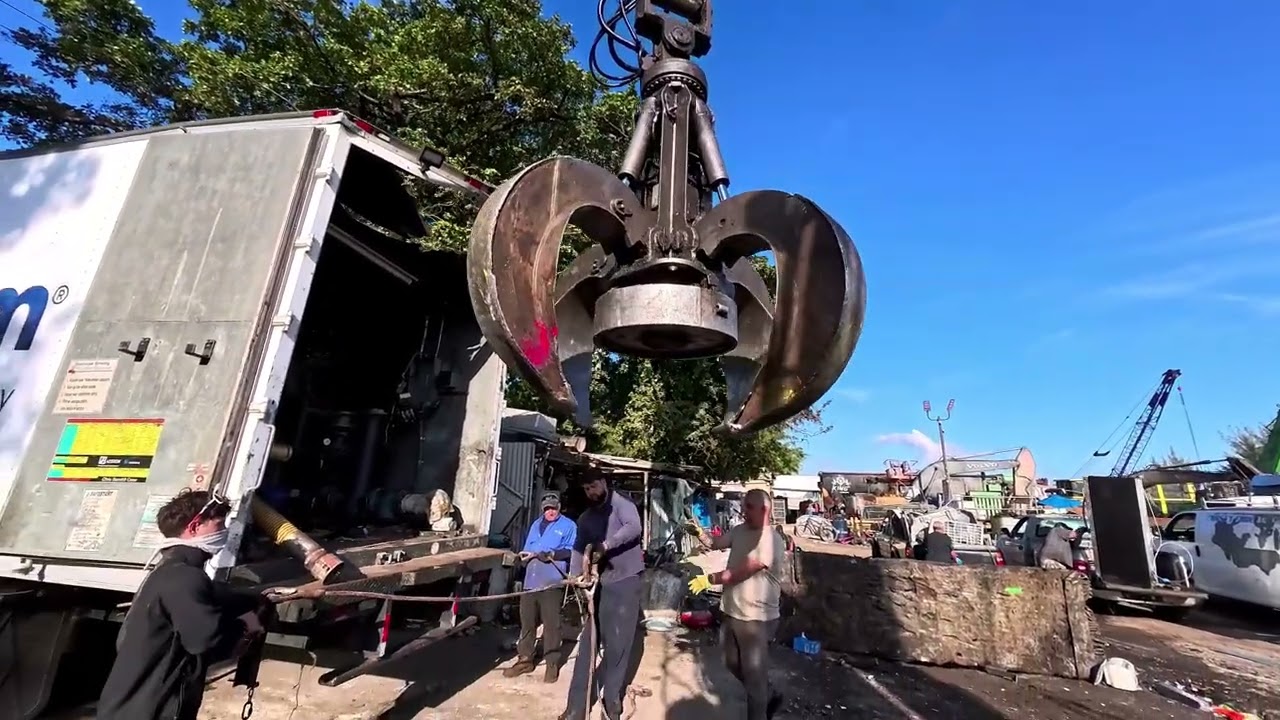 full scrap action in miami; trailer turned into metal