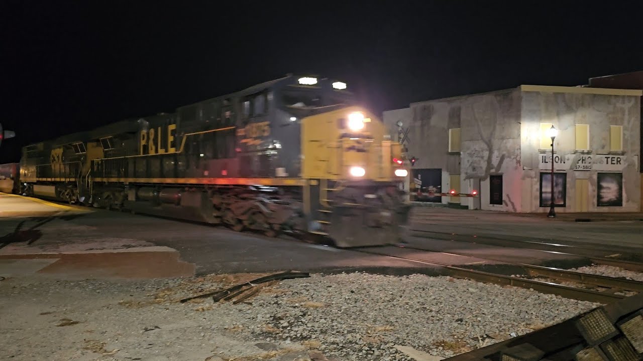 CSX I031-24 with the CSX/PL&E ES44AH leading a CSX ES44AH into Town good size train & Horn Salute 