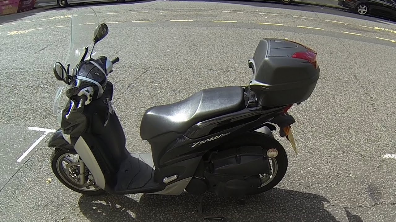 RJ rides a scooter for the first time